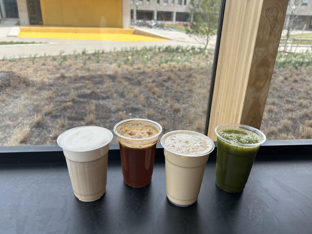 Four drinks lined up in a row