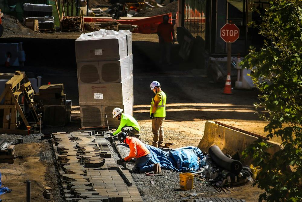 <h5>Construction workers work at the Hobson College construction site.</h5><h6>Nayrouz Tantush / The Daily Princetonian</h6>