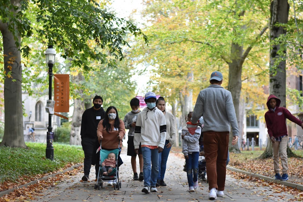 <h5>Visitors walk Princeton's campus in November.</h5>
<h6>Angel Kou / The Daily Princetonian</h6>