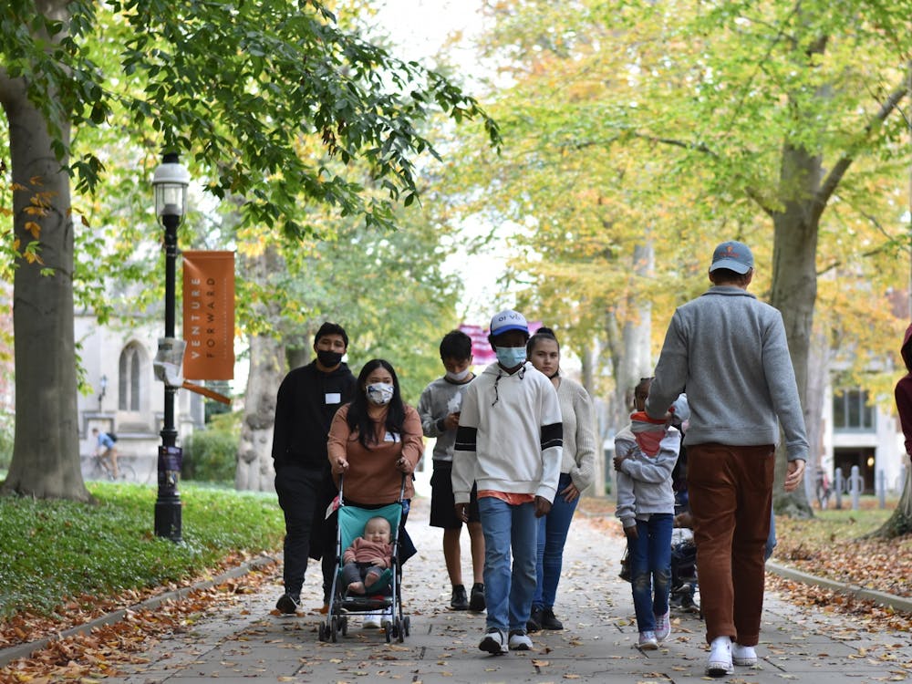 Visitors walk Princeton's campus in November.
Angel Kou / The Daily Princetonian