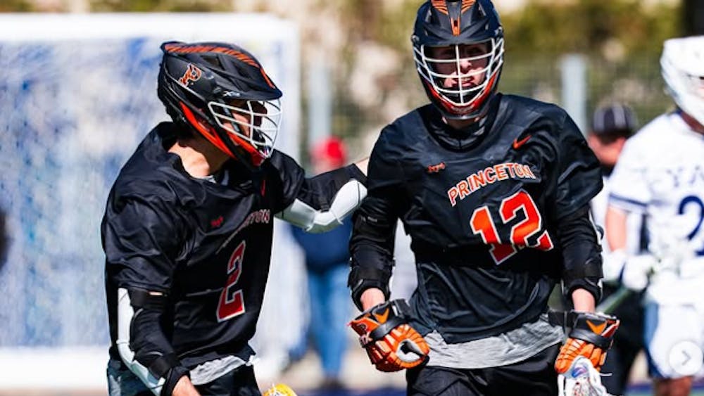 Men's lacrosse players celebrating