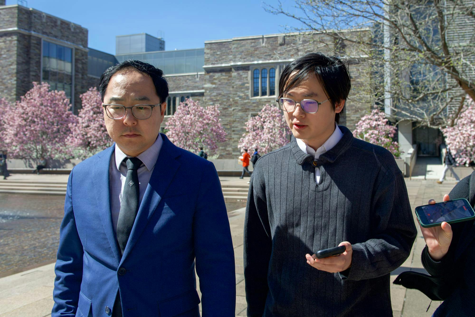 Staff News writer Toby Chang interviewing Sen. Andy Kim by the SPIA Fountain of Freedom.