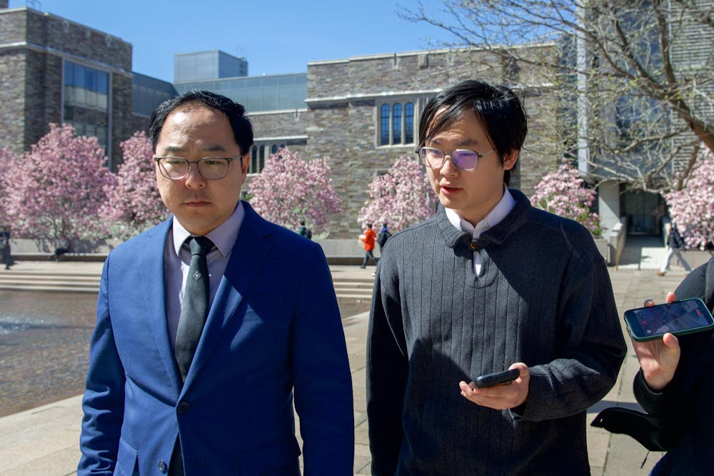 Staff News writer Toby Chang interviewing Sen. Andy Kim by the SPIA Fountain of Freedom.