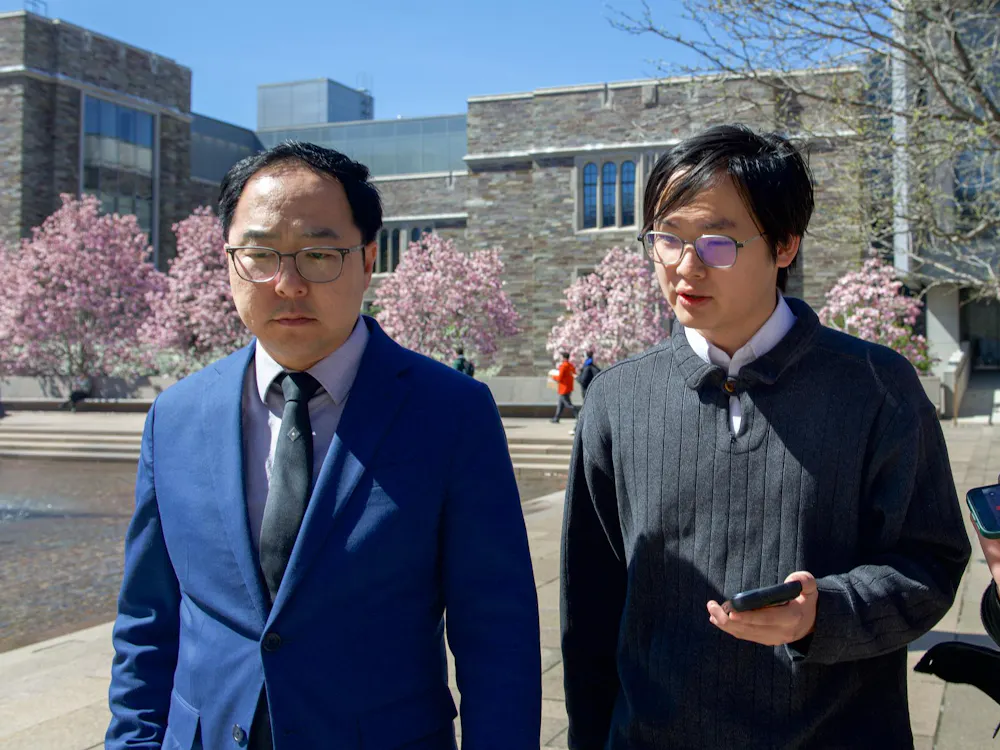 Staff News writer Toby Chang interviewing Sen. Andy Kim by the SPIA Fountain of Freedom.