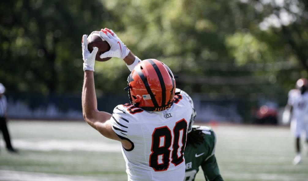 Princeton football player catching the ball.