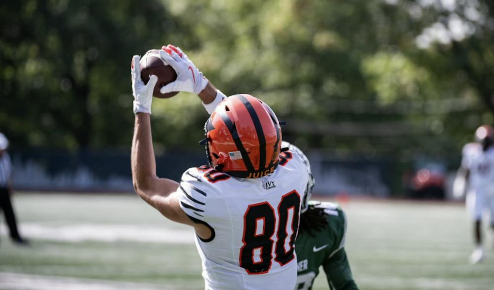 Princeton football player catching the ball.