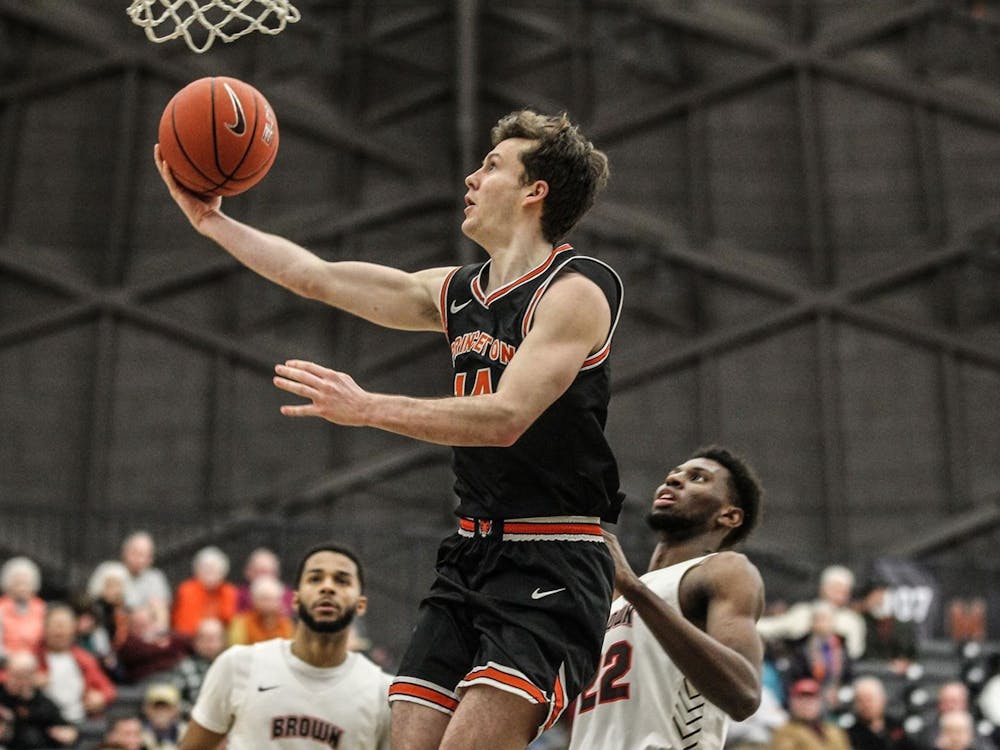 Photo courtesy of Beverly Schaefer / GoPrincetonTigers.com
Wright goes for a layup in Princeton's game against Brown.