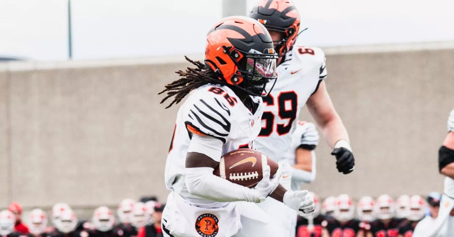 Princeton football player carrying ball