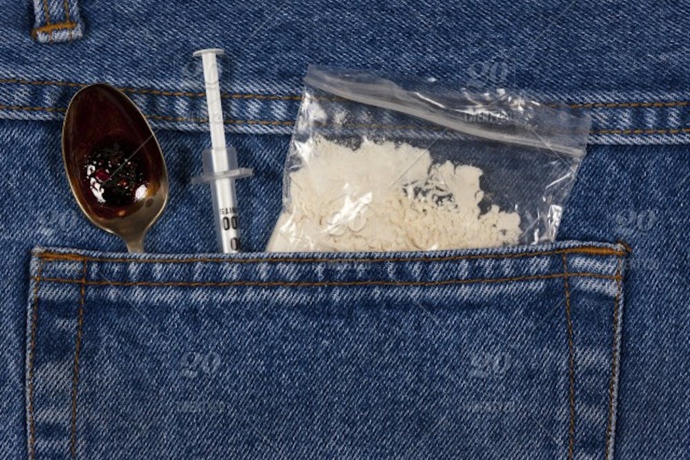 stock-photo-jeans-syringe-drugs-substance-smack-heroin-drug-abuse-crack-cocaine-4cb384f0-4e07-4e9d-8910-6a6700c0b693