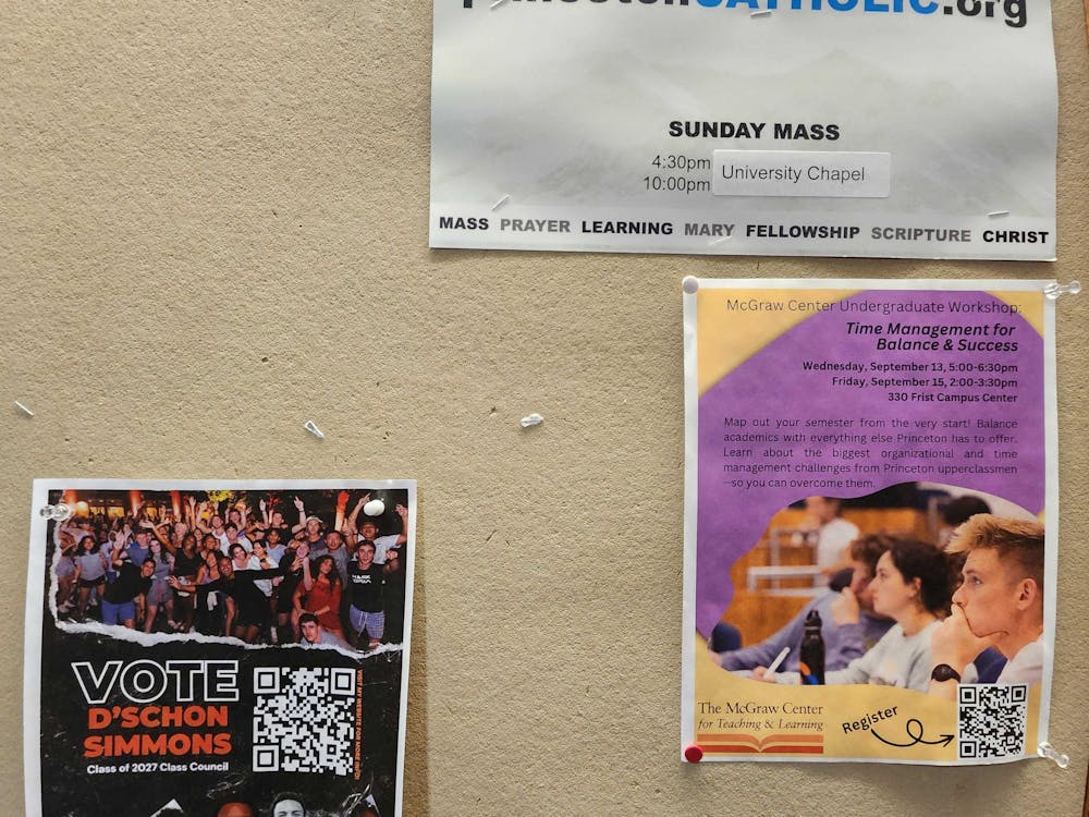 Multicolored posters against a beige board. One says "Vote D'Schon Simmons Class of 2027 Class Council"