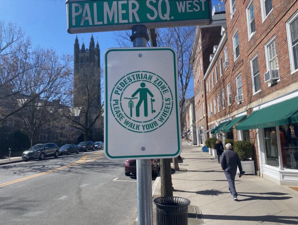 <h5><strong>Signs in zoned areas instruct pedestrians to dismount from vehicles.</strong></h5>
<h6><strong>Tess Weinreich / The Daily Princetonian</strong></h6>
