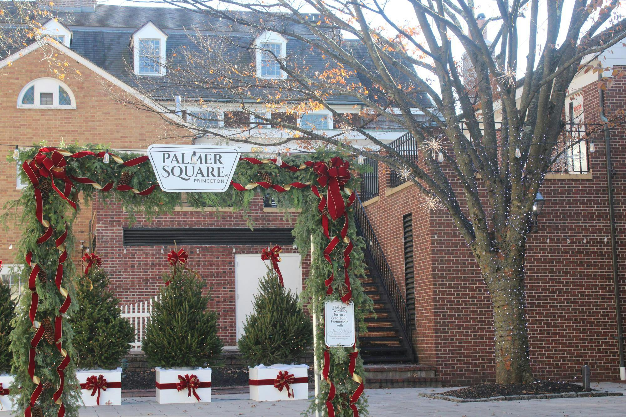 Palmer Square decorated with wreaths and red ribbons for the Princeton Christmas season.