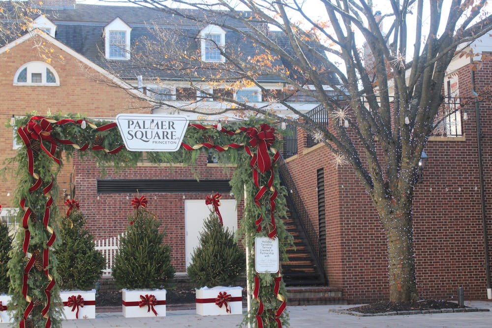 Palmer Square decorated with wreaths and red ribbons for the Princeton Christmas season.
