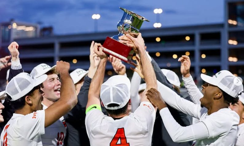 Princeton men's soccer celebrating with the Ivy League trophy.