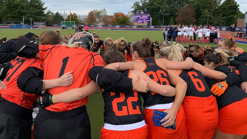 <h5>Princeton field hockey huddles up during their game against UConn.</h5>
<h6>Courtesy of <a href="https://goprincetontigers.com/news/2022/10/2/field-hockey-princeton-completes-weekend-sweep-with-big-win-over-uconn.aspx" target="_self">goprincetontigers.com</a>.</h6>