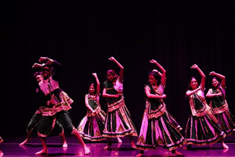 Students dance in a performance by Naacho South Asian Dance Company.