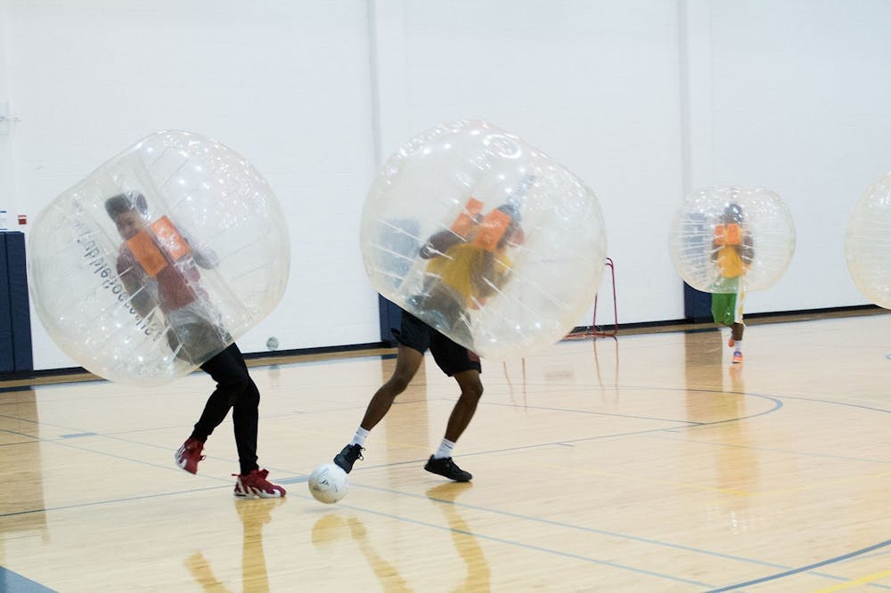<h5>COVID positive students play soccer in Dillon Gym in their new University-provided hamster balls.&nbsp;</h5>
<h6><a href="https://commons.wikimedia.org/wiki/User:Michael_Barera" title="User:Michael Barera" target="_self">Michael Barera</a> / <a href="https://commons.wikimedia.org/wiki/File:14548-Bubble_Soccer-8902_(15974784501).jpg" target="_self">CC 2.0</a></h6>