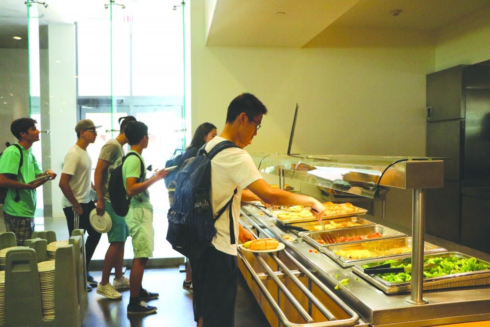 students_getting_food_in_servery_xinyu_chen_col