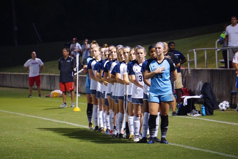 Longwood student-athletes stand during the national anthem