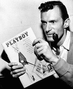 Hugh Hefner with one of the first publications for Playboy Magazine