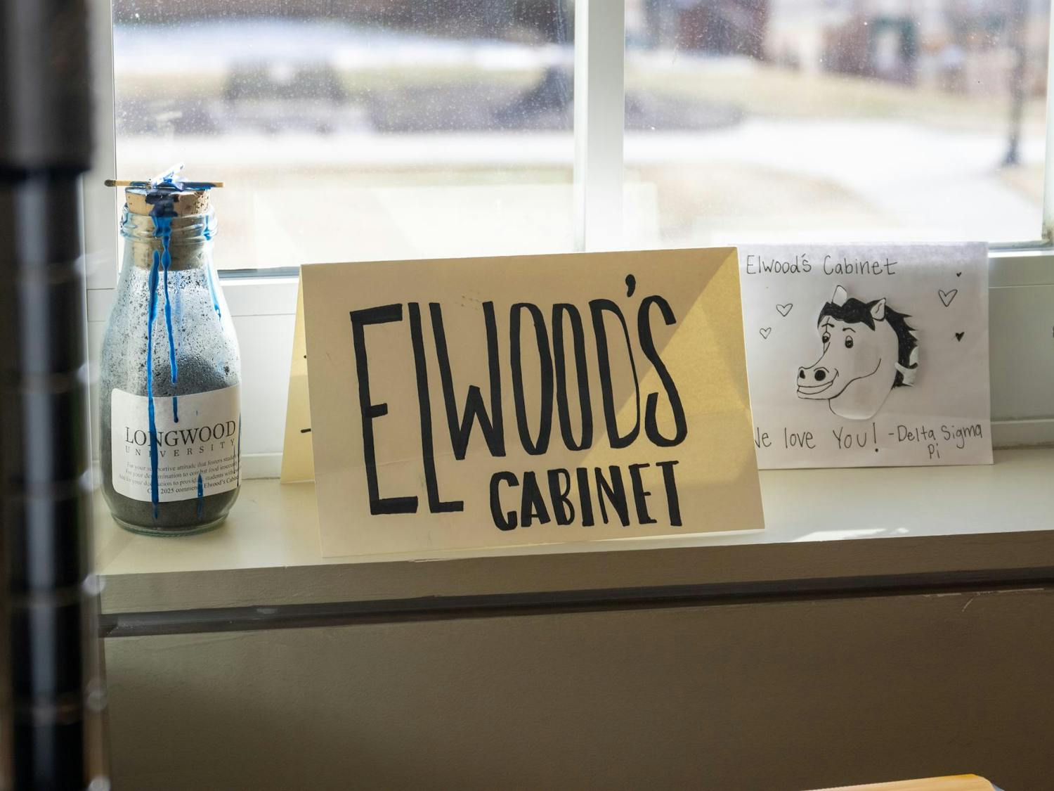 elwoodscabinetsign.JPG