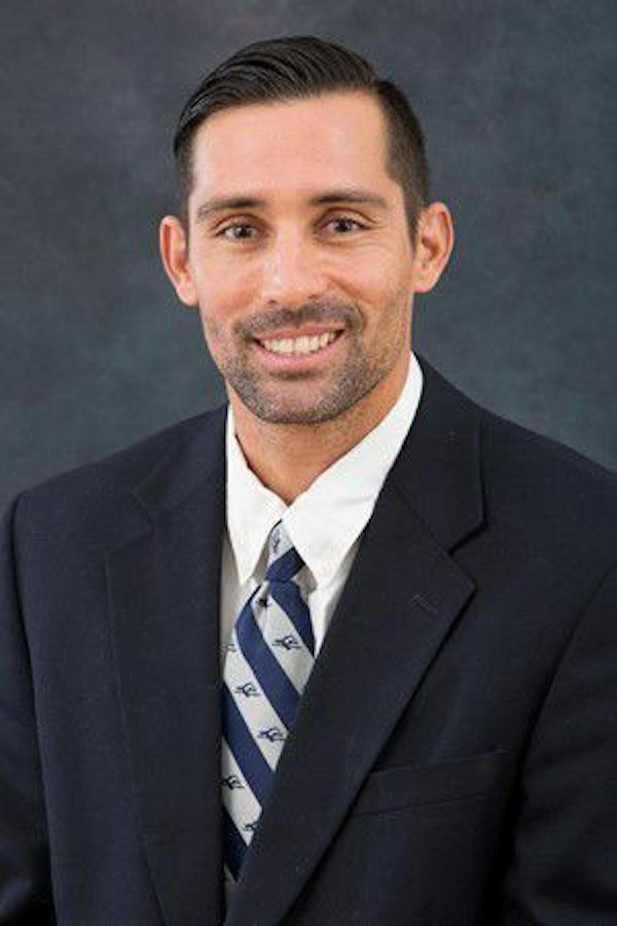 Men's tennis head coach Jhonnatan Medina Alvarez