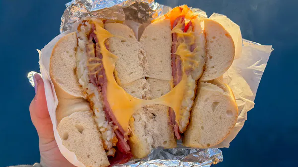 Taylor Ham, cheese and hash brown breakfast sandwich on a bagel _ Photo by Sofia Kasbo.jpg