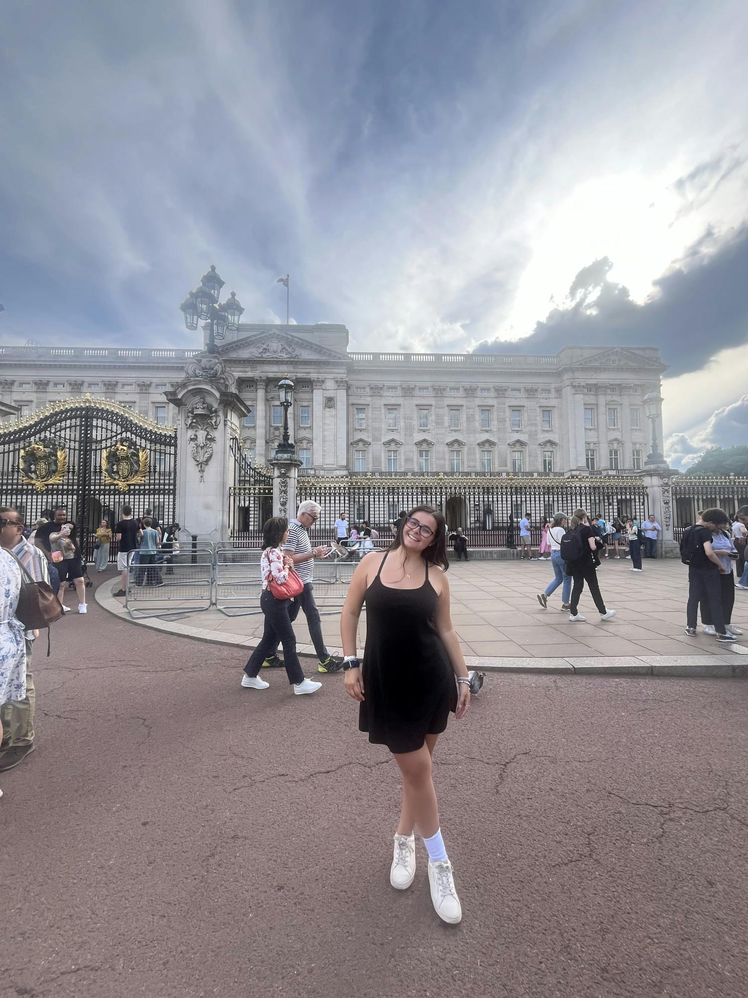 Lauren Hall in front of Buckingham Palace