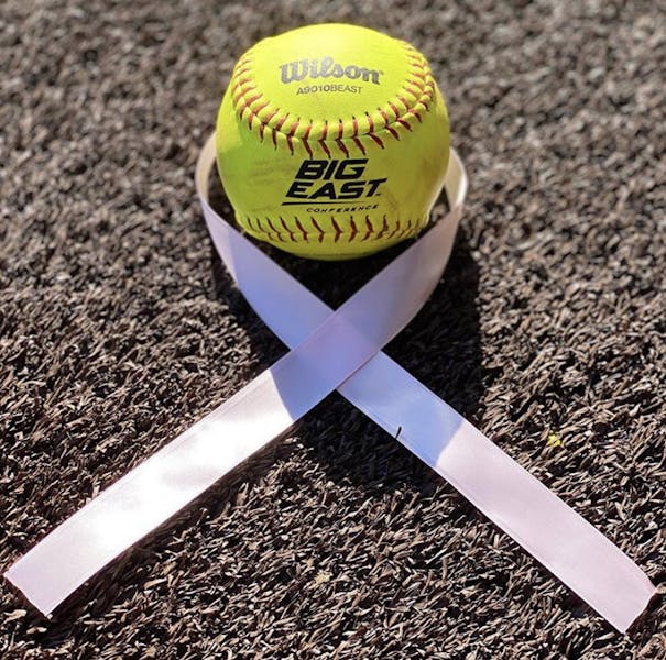 Softball Looks To Uplift Spirits With Breast Cancer Awareness Practice 