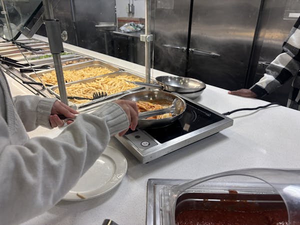 Student making dinner | Photo by Abiha Rupani