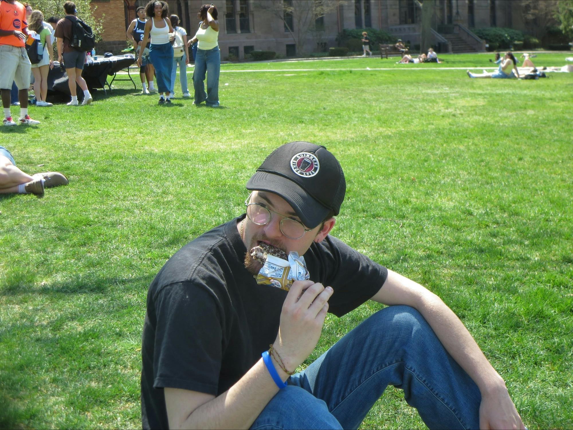 Student eating ice cream on the green | Photo by Sarah Prosetti