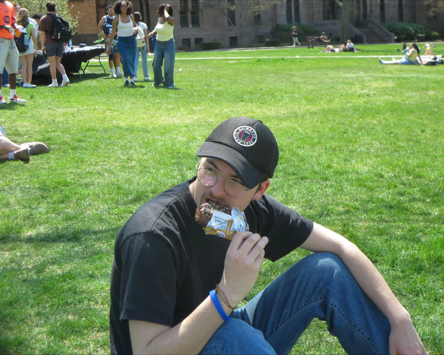 Student eating ice cream on the green | Photo by Sarah Prosetti