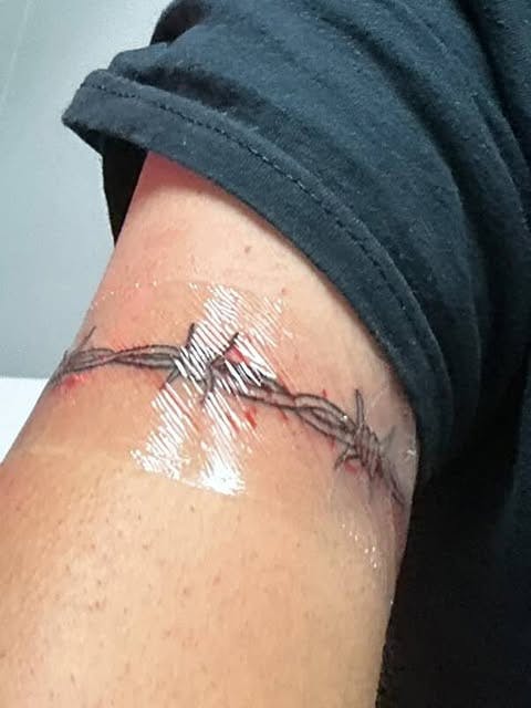 Thorn Tattoo | Photo via Kenny Roman