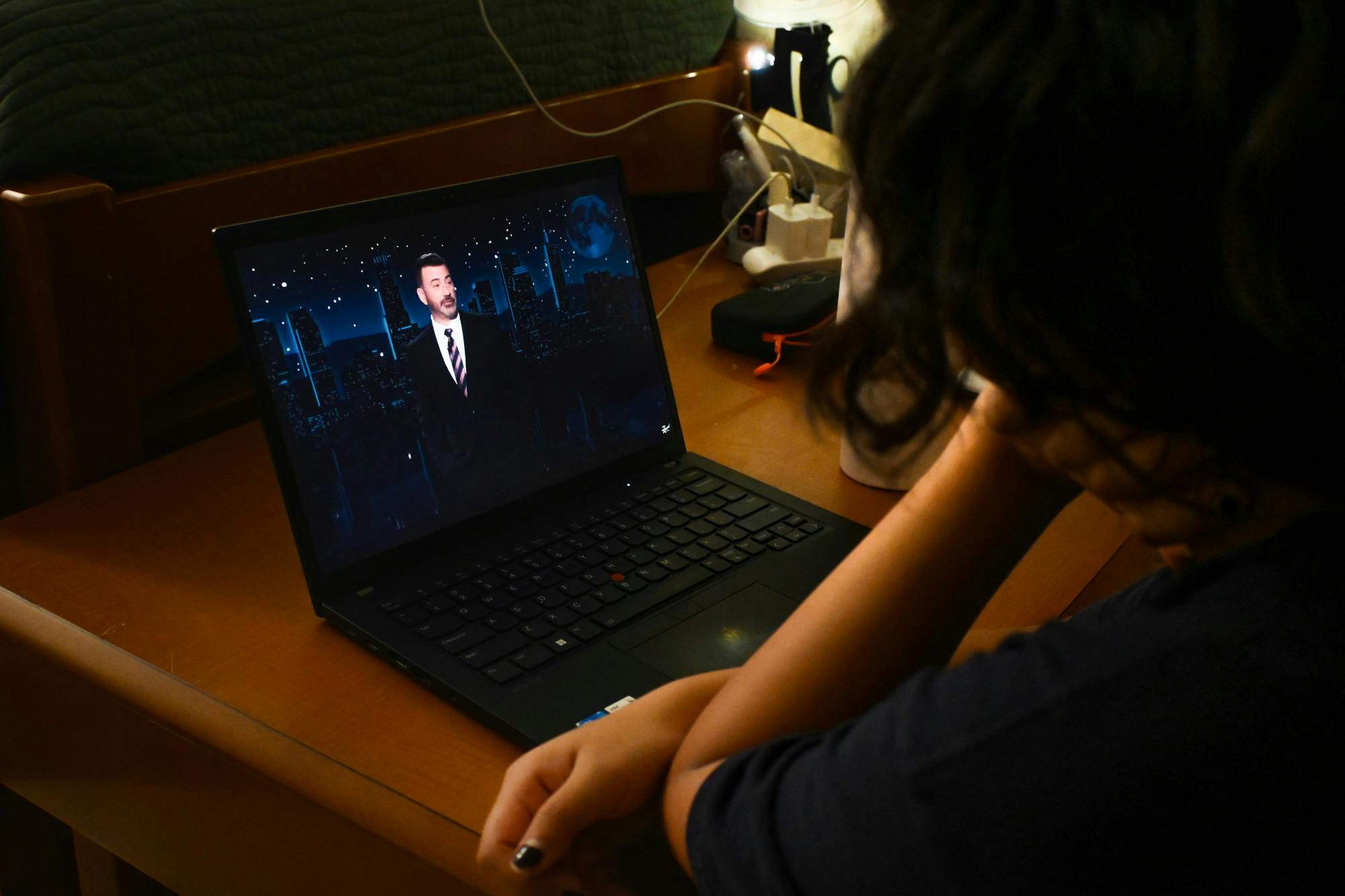 Student watching Jimmy Kimmel's monologue