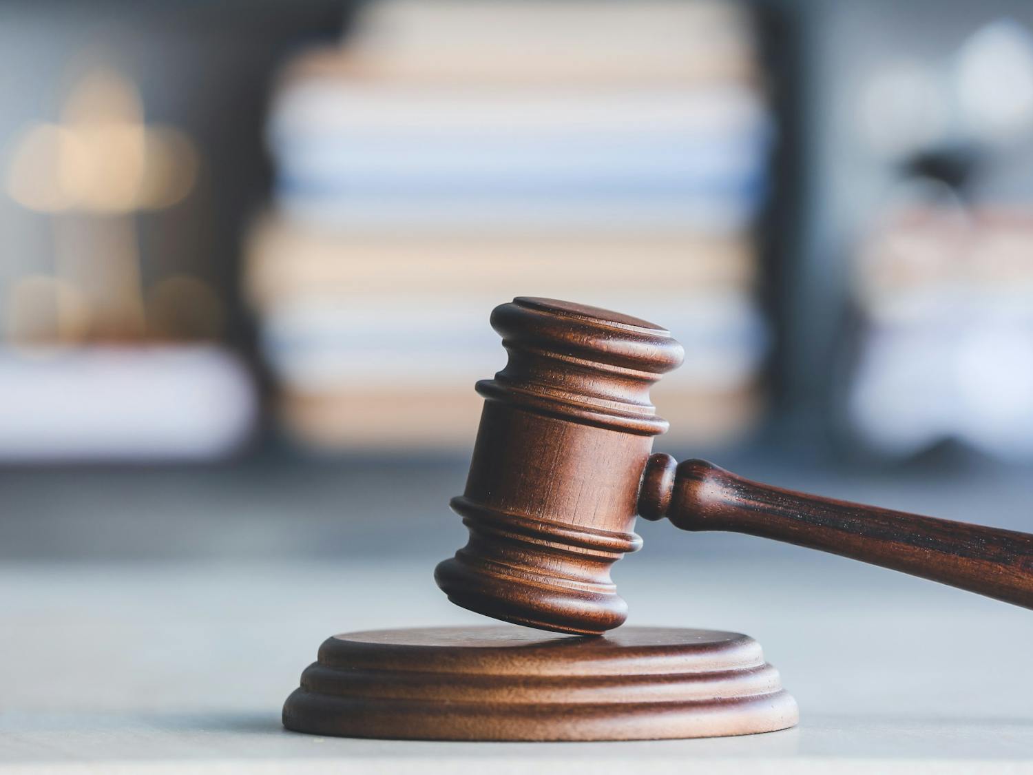 Judge's gavel on table in office
