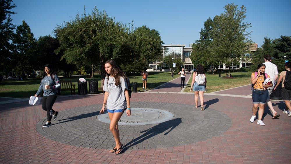cropped-Students-on-Green