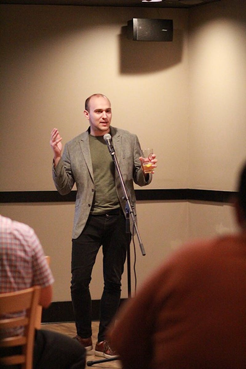 Andrew Burdge won the first Story Slam with a story about his childhood.