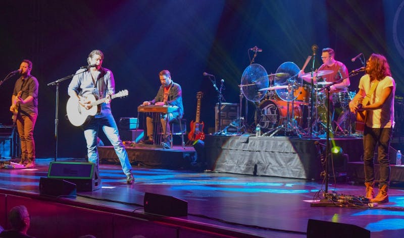 Joe Nichols and his backup band play on stage at H. Ric Luhrs Performing Arts Center. The audience was treated to the classic elements of country and an evening of good grooves.