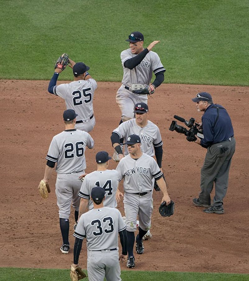 The Yankees celebrate an early-season road victory over the Baltimore Orioles. New York has clawed its way to a 19-14 start despite having 13 players on the injured list, including stars Aaron Judge and Giancarlo Stanton.
