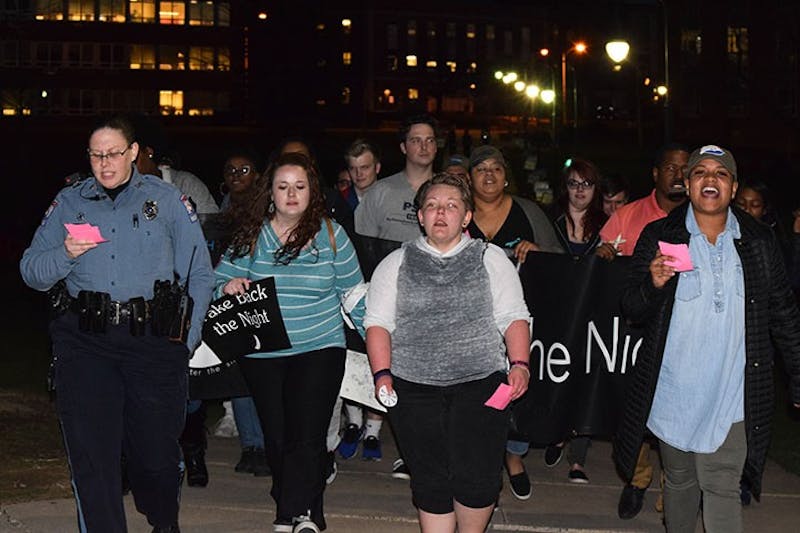 SU students march this past April during the “Take Back the Night” event, which aims to educate SU students about sexual assault and discrimination.&nbsp;
