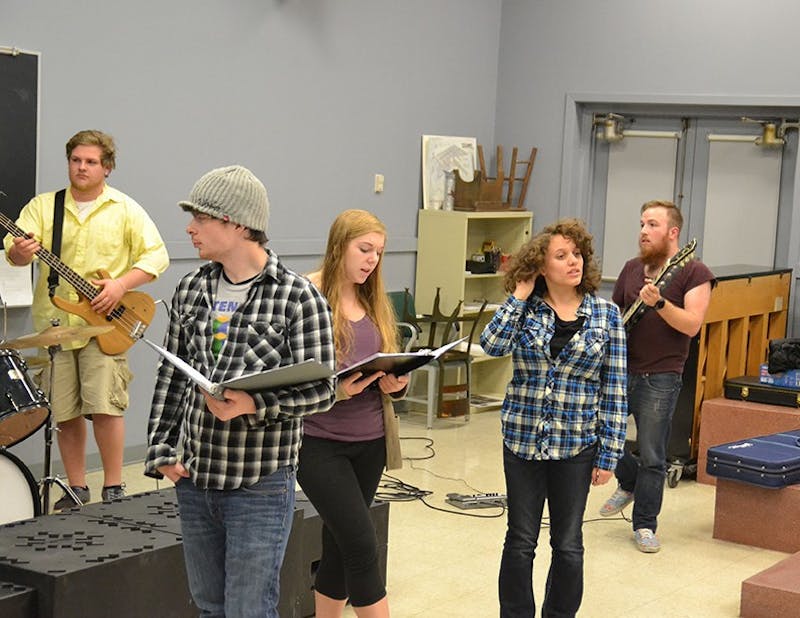 Members of the “American Idiot” cast and pit rehearse for their upcoming show late at night in Memorial Auditorium.