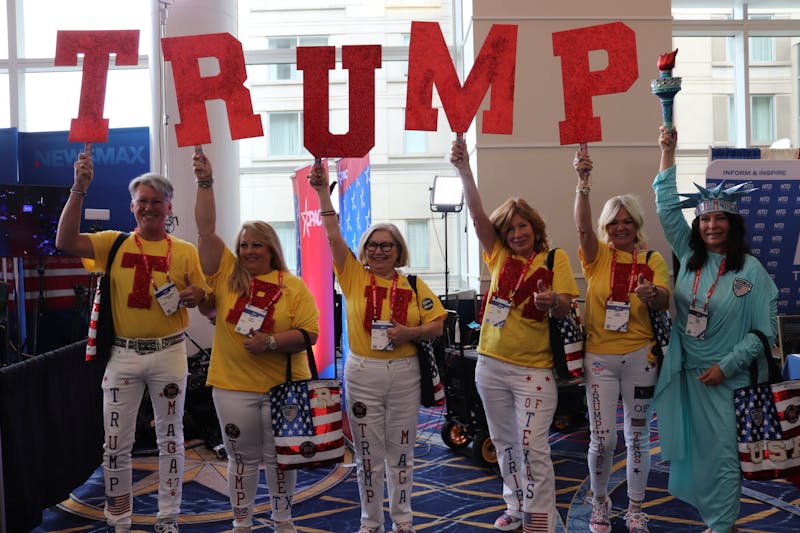 The Trump Tribe from Texas poses for a photo at the 2024 Conservative Political Action Conference.&nbsp;