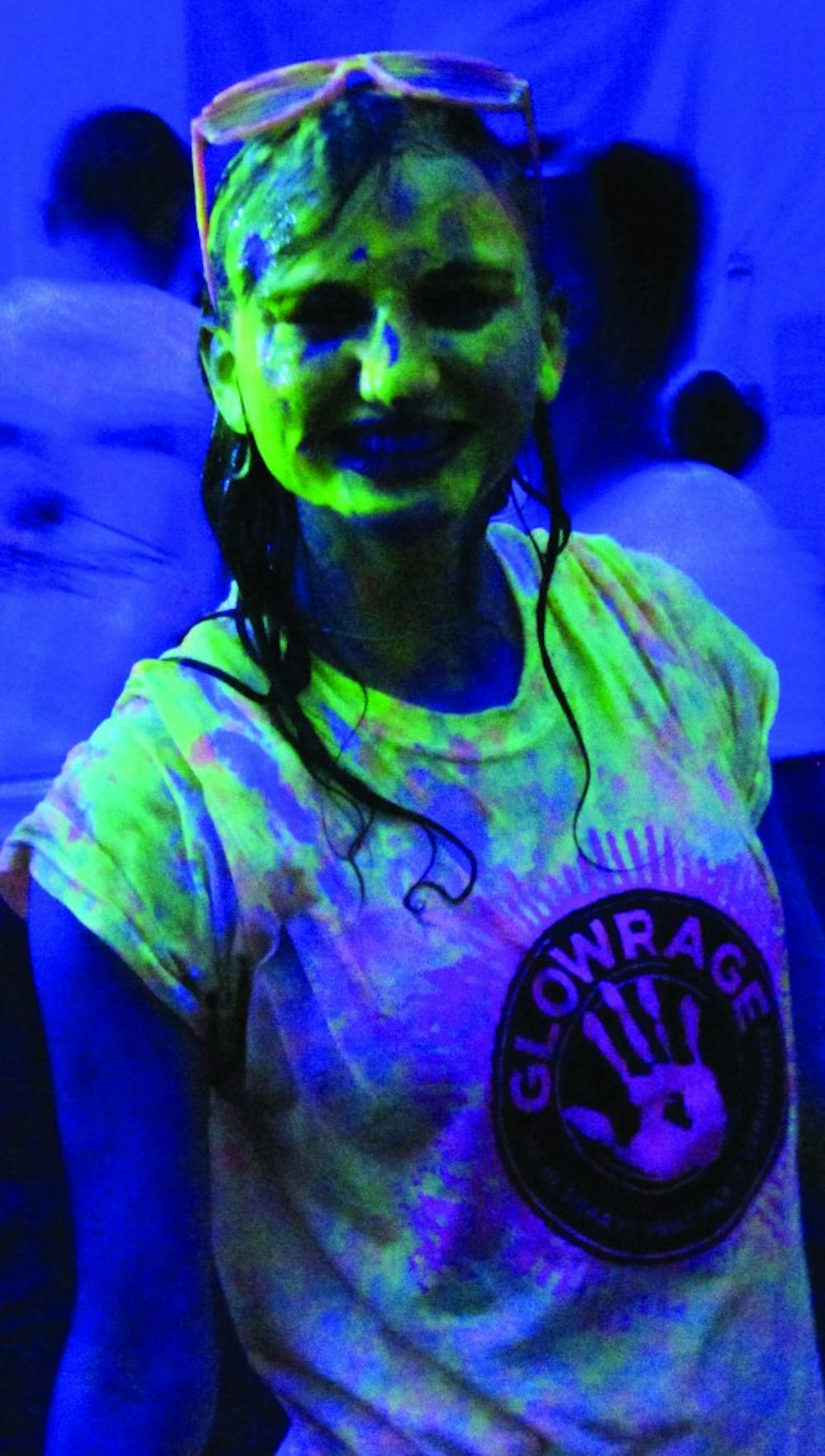 Students prepare for finals with a paint-covered “Glowrage”