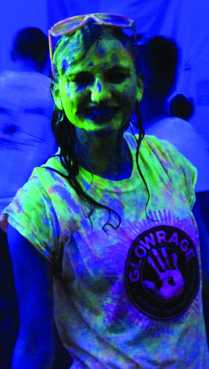 An SU student sports a paint-covered face during the event.