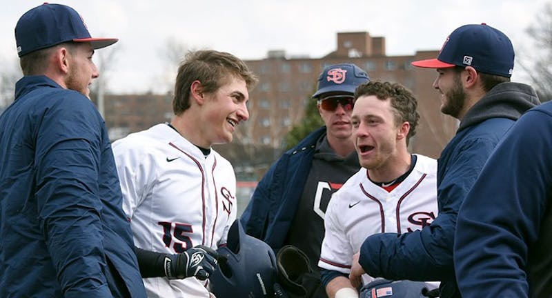 Zack Zoller, No. 15, hits a walkoff three-run home run in the first game of the weekend doubleheader against UPJ. 