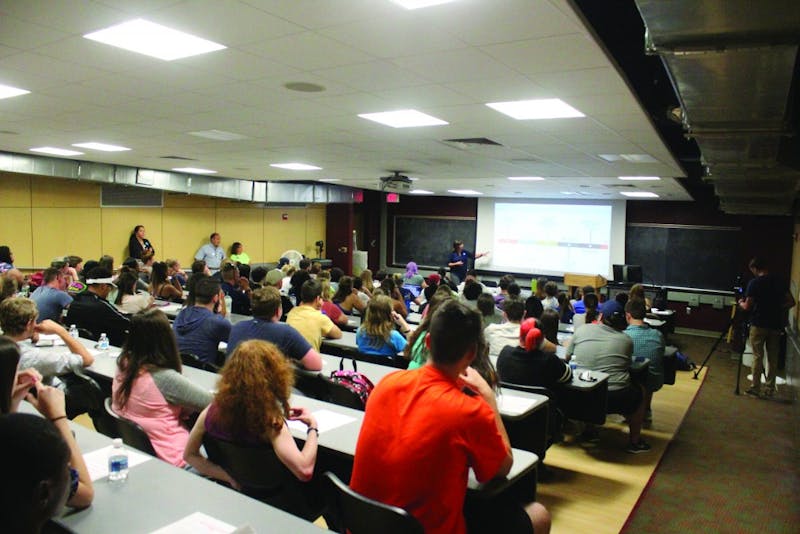 President of SU’s chapter of APSCUF Kara Laskowski shows students a timeline of events that led up to the vote to authorize a strike. About 100 students showed up to listen to APSCUF members.