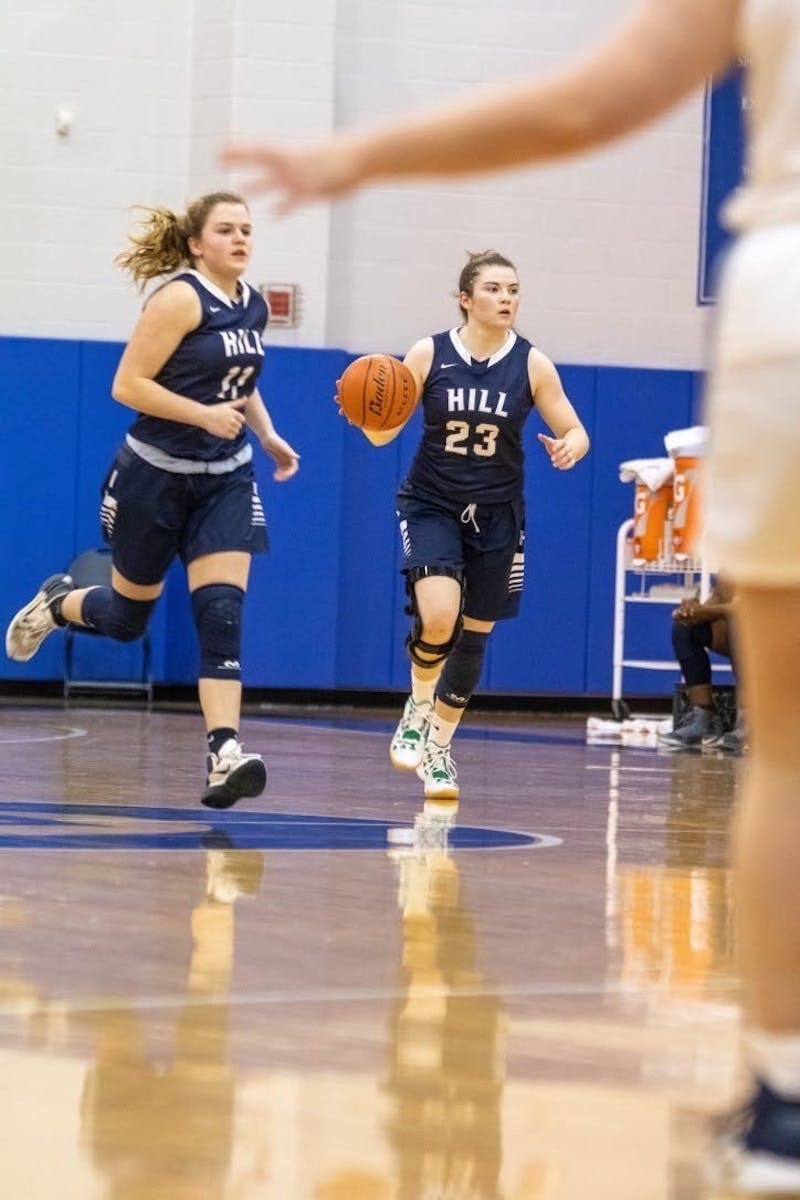 In her season with The Hill School in Pottstown, Pennsylvania, Nealon (dribbling ball) averaged 12 points, three assists and two steals per game. Her 2019 campaign earned her Team MVP honors.
