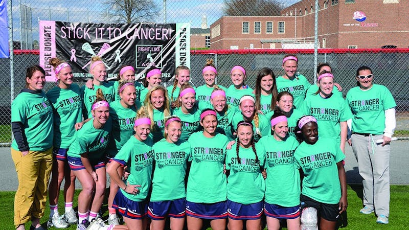 The SU women’s lacrosse team wore special shirts for its “Stick it to Cancer” game at Robb Sports Complex against Mercyhurst University. The team raised money for Susan G. Komen and the National Ovarian Cancer Coalition.