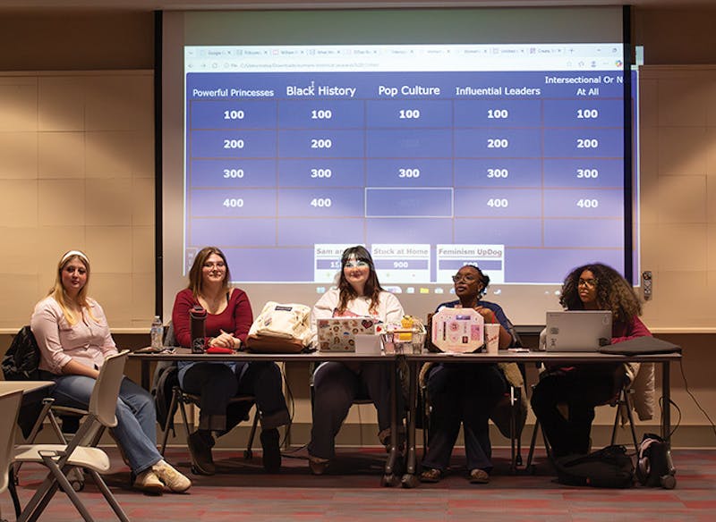 Members of the Feminists of Shippensburg hosting Women's Historical Jeopardy.&nbsp;