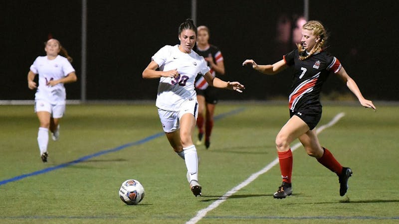 Lauren Ocker pushes the ball up the sideline during the Raiders' 3-1 loss to East Stroudsburg. Ocker took four shots, including one on goal in the loss.